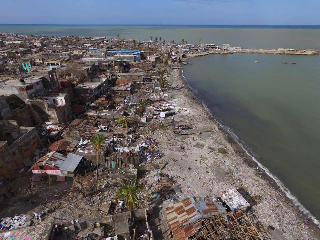 Buildings destroyed and damaged by Hurricane Matthew are seen in Jeremie, in western Haiti, on October 7, 2016. The full scale of the devastation in hurricane-hit rural Haiti became clear as the death toll surged over 400, three days after Hurricane Matth