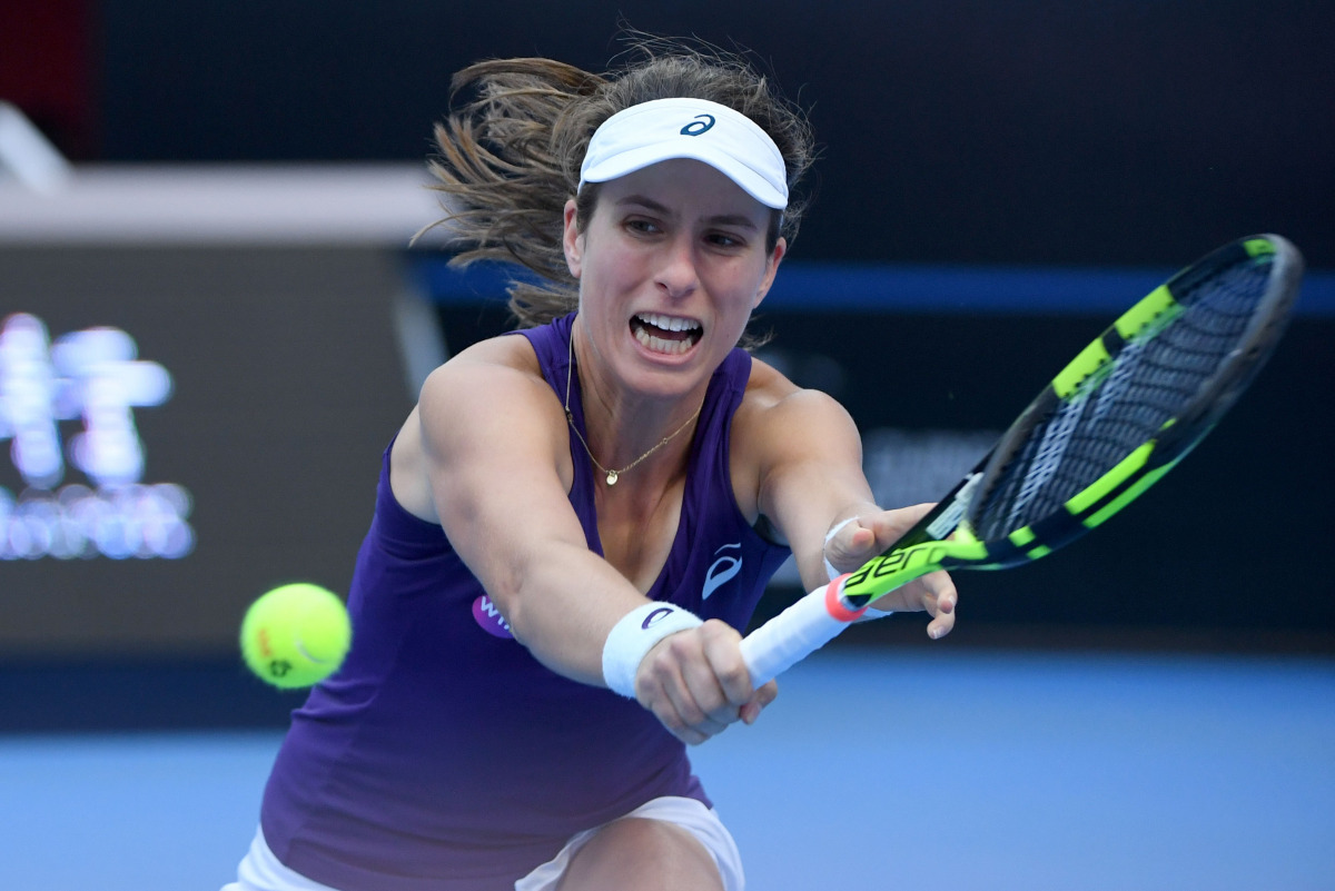 Johanna Konta of Britain hits a return against Madison Keys of the US during their women's singles semi-final match at the China Open tennis tournament in Beijing on October 8, 2016. (AFP / WANG ZHAO)