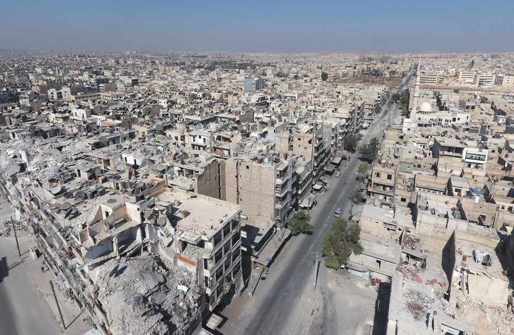 An aerial view of the buildings destroyed by the Assad Regime forces and Russian Army in the Tariq al-Bab neighborhood of Aleppo, Syria on October 2016. ( Jawad al Rifai - Anadolu Agency )