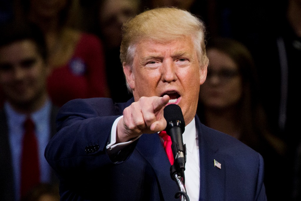 Republican presidential nominee Donald Trump speaks during a rally at Mohegan Sun Arena in Wilkes-Barre, Pennsylvania on October 10, 2016. / AFP / DOMINICK REUTER