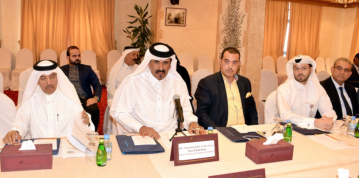 QC Vice-Chairman Mohamed bin Ahmed bin Tawar (second left) speaking at the event
