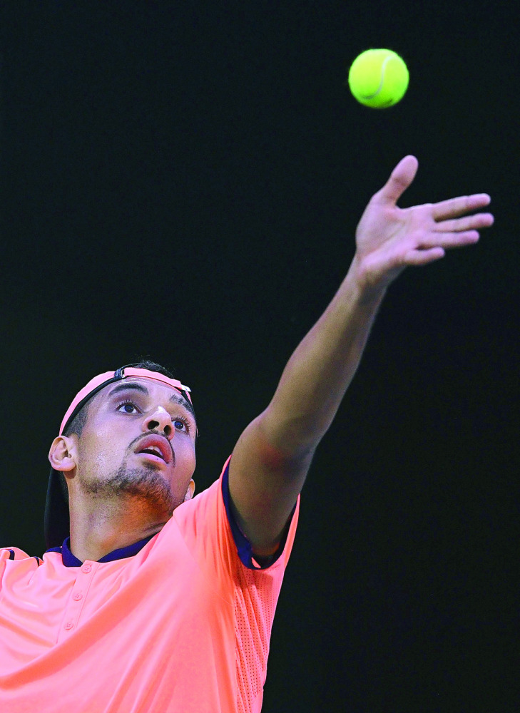 Nick Kyrgios of Australia serves against Mischa Zverev of Germany during their men’s singles match at the Shanghai Masters tennis tournament in Shanghai, China