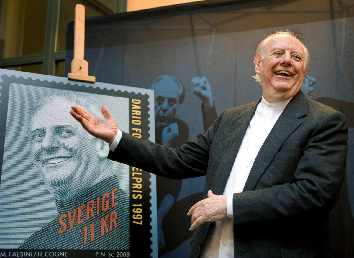 Italian 1997 Nobel literature prize winner Dario Fo reacts upon unveiling a commemorative postage stamp in Stockholm. REUTERS/Scanpix/Anders Wiklund/File Photo 
