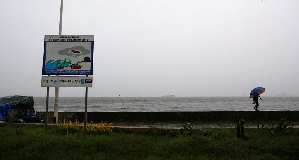 A resident walks past a 