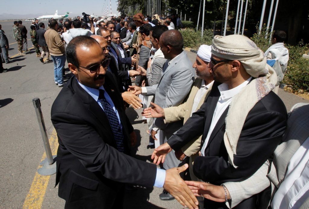 Members of the Houthi negotiating team who were stranded in Oman are welcomed upon the team’s arrival at the airport in Sanaa, Yemen, Oct. 15. (Reuters/Mohamed al-Sayaghi)