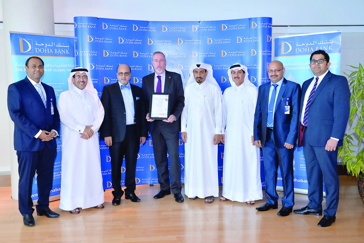Dr. R Seetharaman (third left), CEO, Doha Bank Assurance Company, with other officials during the ceremony. 