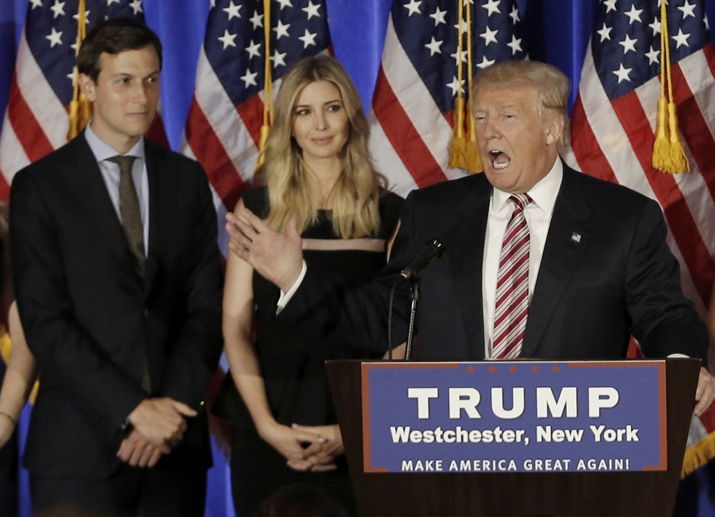 Republican U.S. presidential candidate Donald Trump speaks as his son-in-law Jared Kushner (L), daughter Ivanka listen at a campaign event at the Trump National Golf Club Westchester in Briarcliff Manor, New York, U.S., June 7, 2016. REUTERS/Mike Segar/Fi
