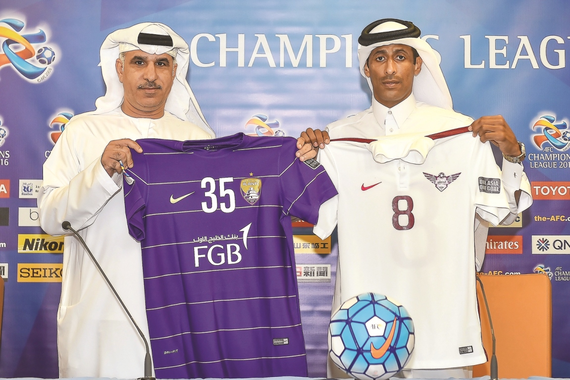 El Jaish and Al Ain club officials display  the team jerseys during the press conference yesterday.  