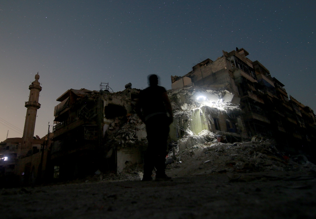 ALEPPO, SYRIA - OCTOBER 17 : Wreckage of a building is seen after War crafts belonging to the Russian army carried out an airstrike over opposition controlled residential area of Katirci neighborhood of Syria on October 17, 2016. ( Jawad al Rifai - Anadol