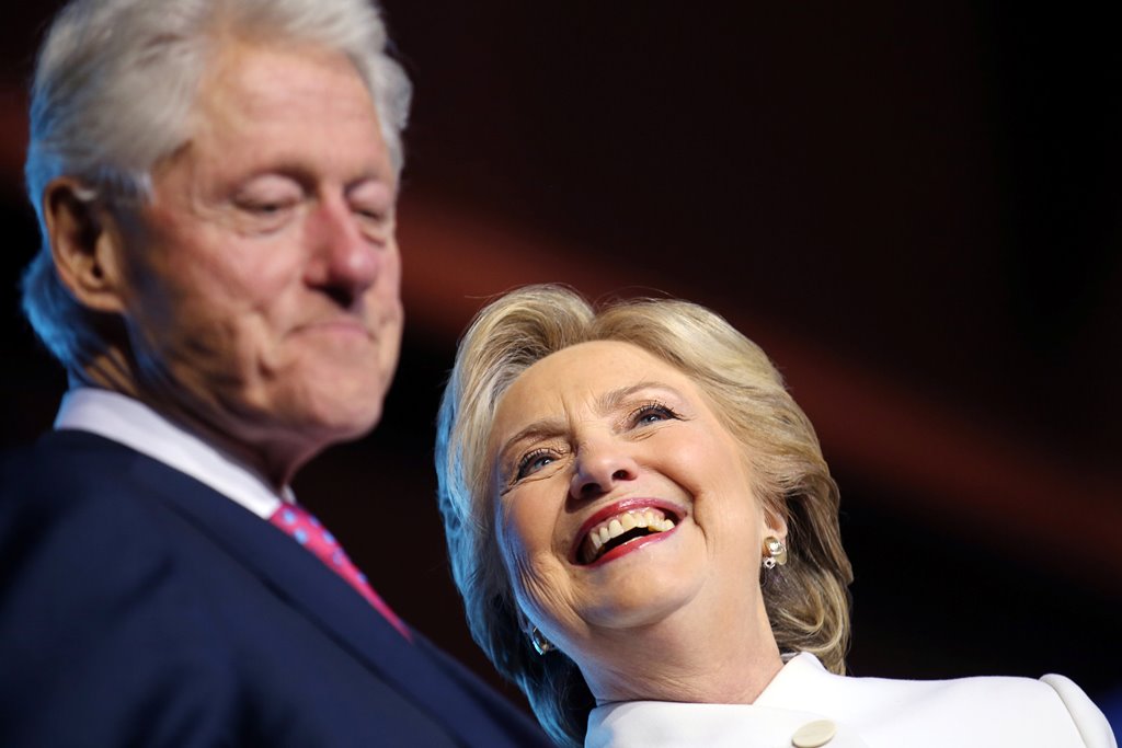 U.S. Democratic presidential candidate Hillary Clinton and her husband, former President Bill Clinton, attend a campaign event after the third and final 2016 presidential campaign debate in North Las Vegas, Nevada, US, October 19, 2016. REUTERS/Carlos Bar