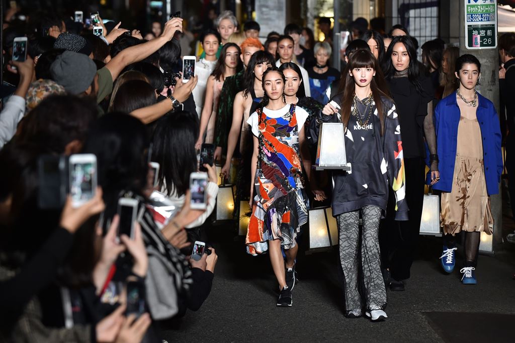 Models display creations by designer Christelle Kocher during the KOCHE AW16 and SS17 mix collection show presented at Amazon Fashion Week in Tokyo. AFP / KAZUHIRO NOGI