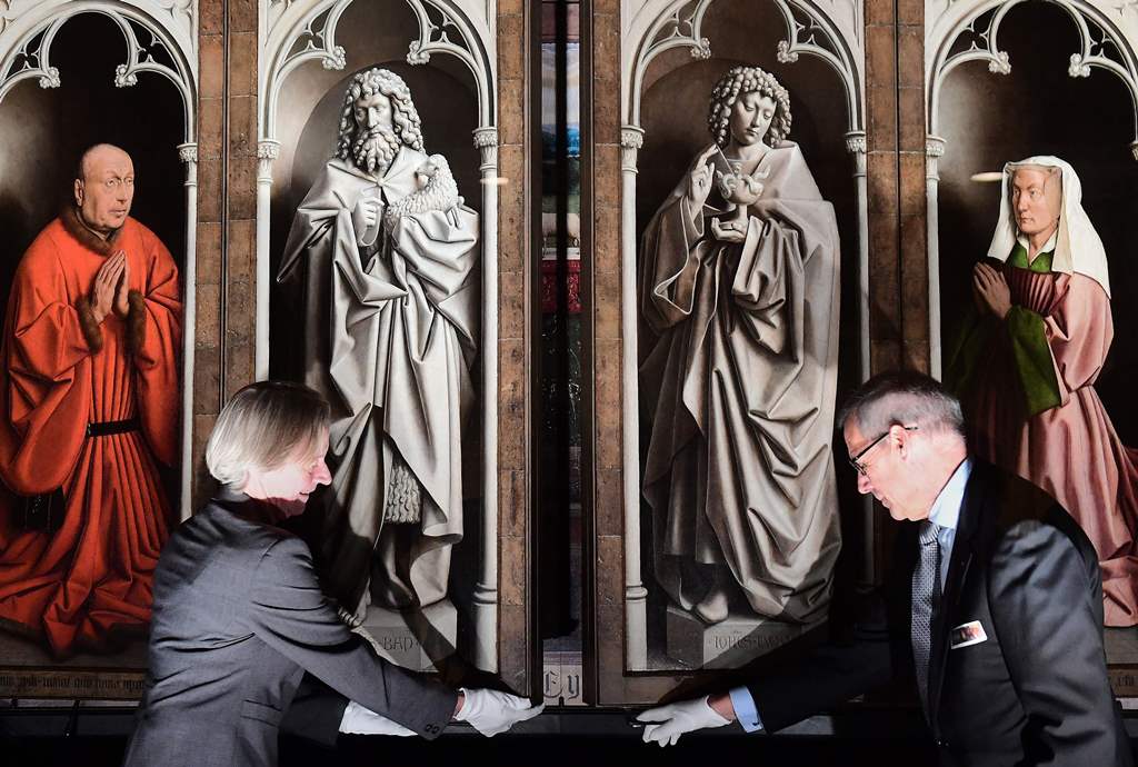 Officials unveil the restored exterior panels of 