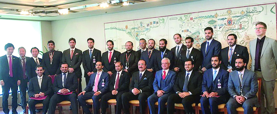 “Participants of QLC’s Rising Leaders Program pose with dignitaries and executives at the ITOCHU office in Tokyo, Japan”
