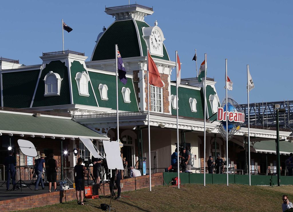 Media gather at the Dreamworld theme park on Gold Coast on October 25, 2016, after four people were killed when a park ride malfunctioned. Four people were killed at a theme park on Australia's popular Gold Coast on October 25, police said, with witnesses