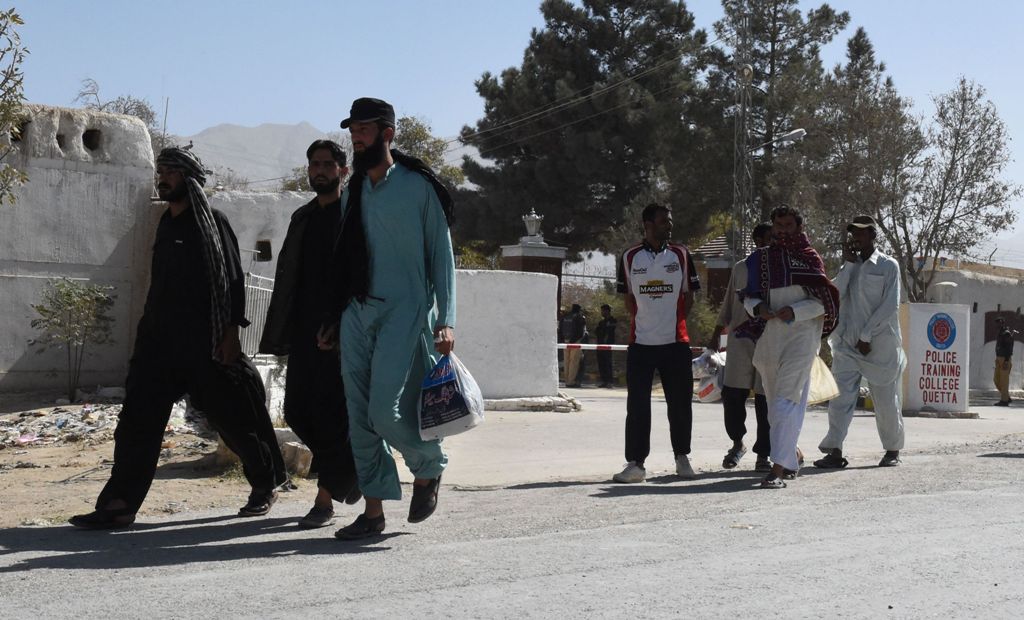 Pakistani police cadets leave the Police Training College Balochistan following a militant attack in Quetta on October 25, 2016.  AFP / BANARAS KHAN
