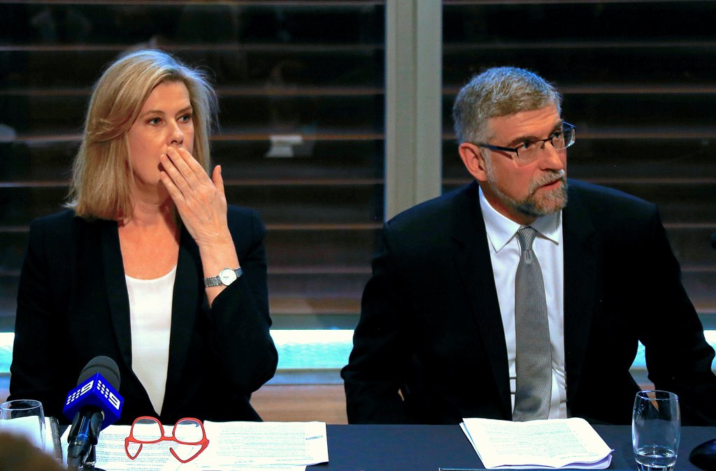 Chief Executive Officer (CEO) Deborah Thomas (L) of Australia's Ardent Leisure Group, the owner of the amusement park Dreamworld, reacts as she sits with company Director George Venardos after the company's annual general meeting (AGM) in Sydney, Australi
