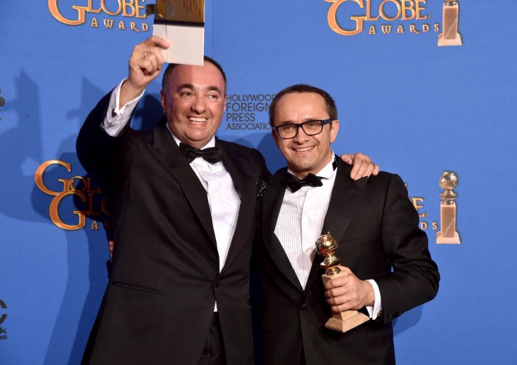 Writer/producer Alexander Rodnyansky (L) and director Andrey Zvyagintsev, winners of Best Foreign Language Film for 'Leviathan,' pose in the press room during the 72nd Annual Golden Globe Awards on January 11, 2015 in Beverly Hills, California (AFP Photo/