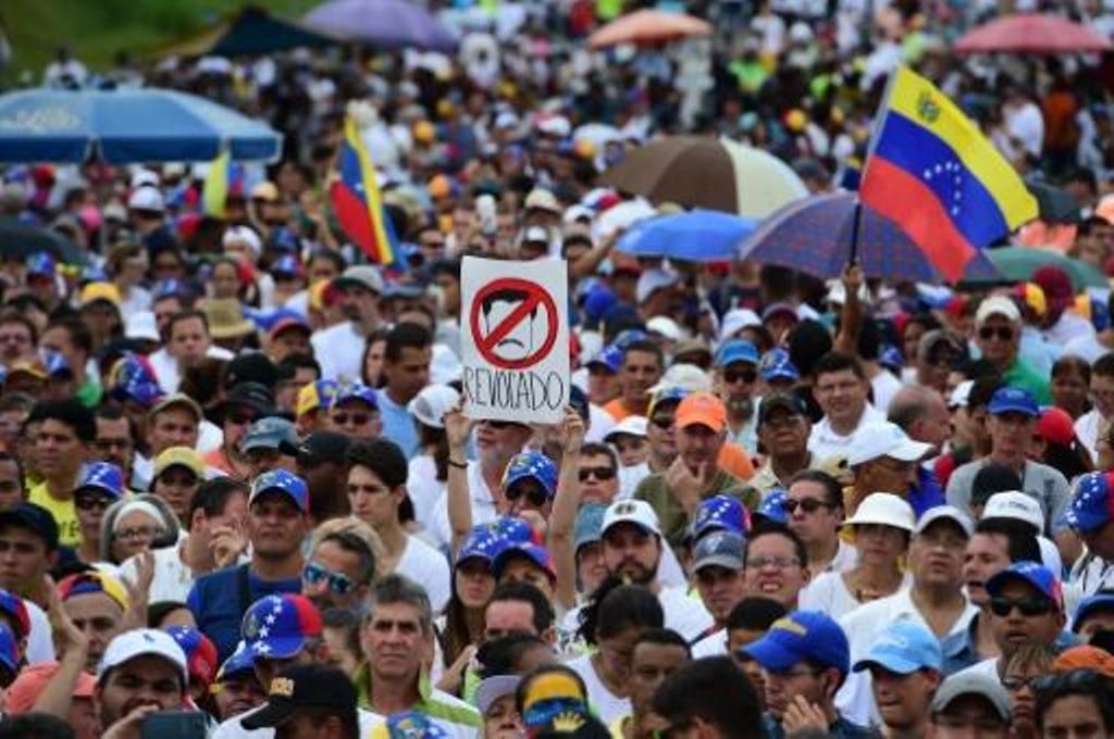 Venezuela, opposition agree to hold talks. / AFP.