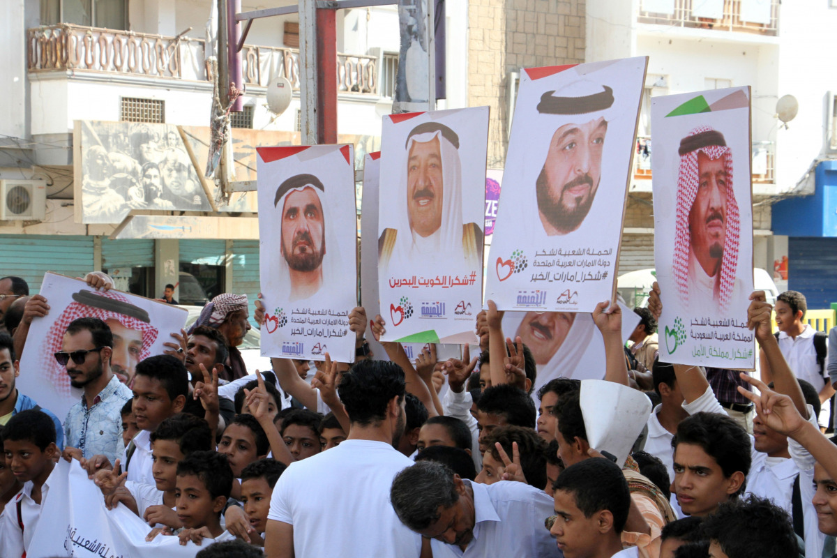 Yemeni protestors carry placards bearing the portraits Gulf leaders of during a demonstration in support of Saudi Arabia, after the Saudi-led coalition said Yemeni rebels have launched a ballistic missile earlier in the week that was shot down near the ho