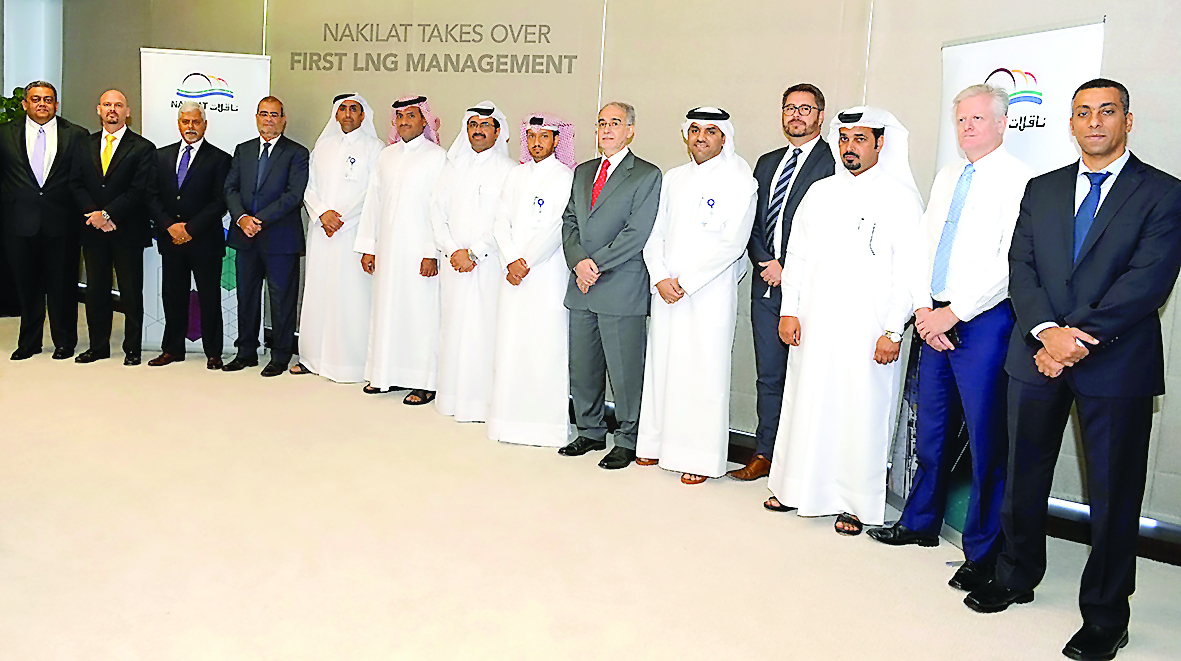 Minister of Energy and Industry and Chairman of Nakilat H E Dr. Mohammed bin Saleh Al Sada and other officials after announcing the taking over of Q-Max LNG carrier Mozah from Shell International Trading and Shipping Company Limited. 