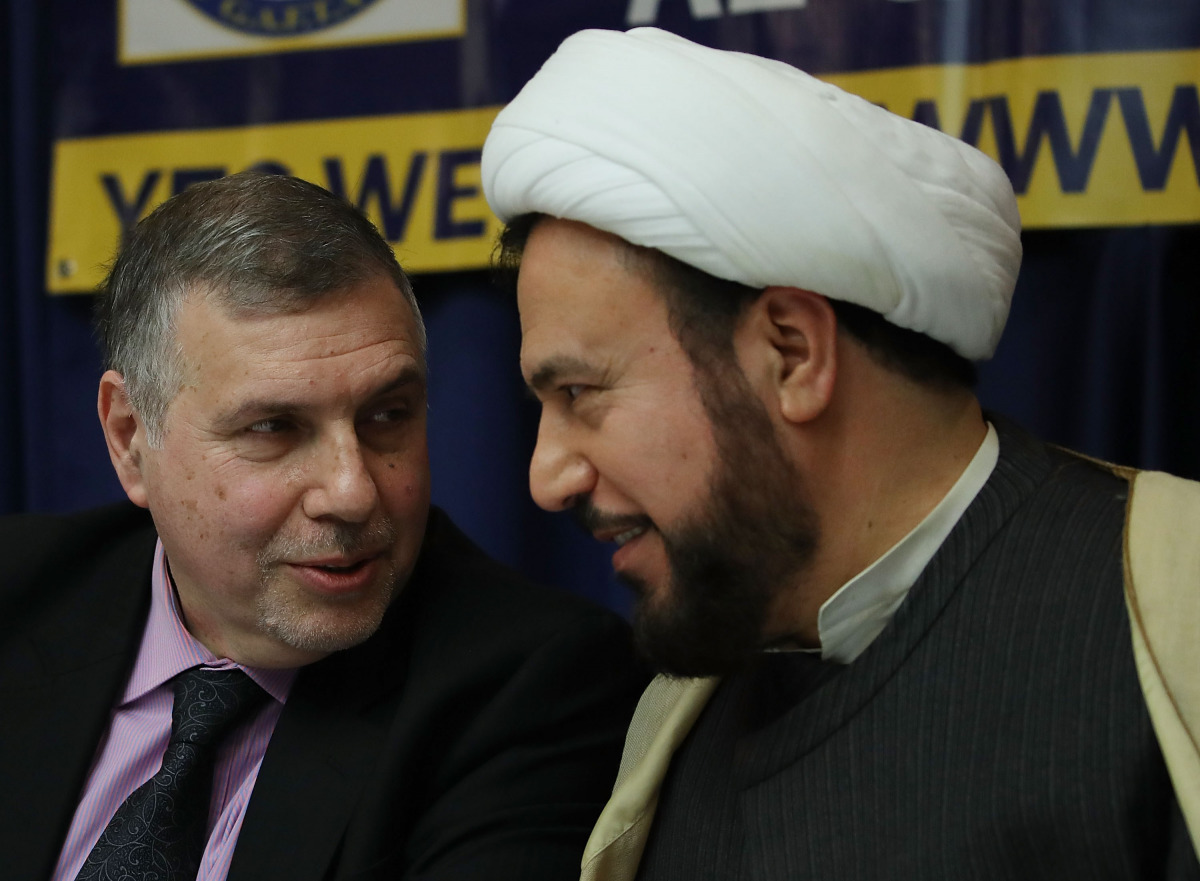Former Iraq Minister of Communications Mohammed Allawi, (L), and Imam Hersham Al Huseini, co-founder of the Iraqi opposition movement against Saddam Hussein, pariticipate in a discussion billed as 