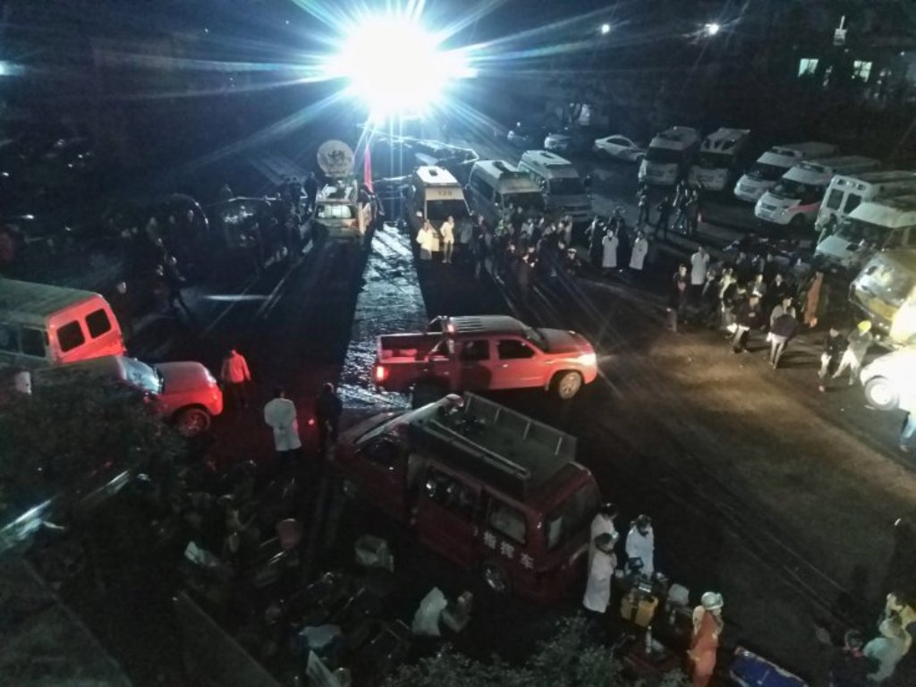 Rescuers work at an explosion site of a coal mine in Chongqing, China on 31 OctoberREUTERS/Zhou Shijie.
