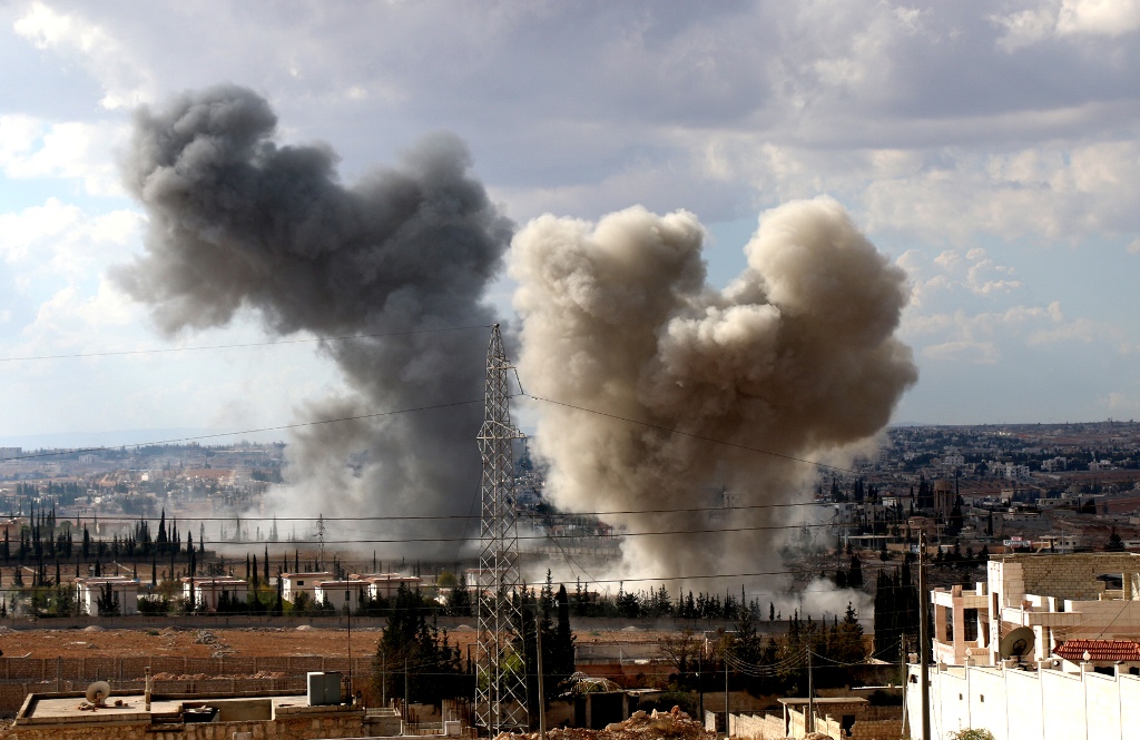 Smoke rises after Syrian oppositions attack Assad Regime controlled Military academy during an operation to break the siege of the regime forces in the city center in Aleppo, Syria on October on October 31, 2016. ( Mahmoud Faisal - Anadolu Agency )