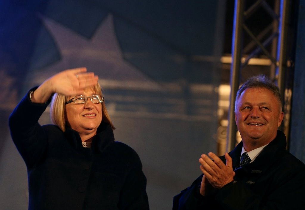 Tsetska Tsacheva (L), presidential candidate of the Bulgaria's ruling centre-right GERB party, waves next to vice-presidential candidate Plamen Manushev during an election rally in Plovdiv, Bulgaria November 4, 2016. Reuters/Stoyan Nenov
