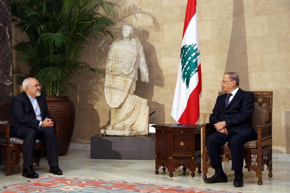 A handout picture provided by the Lebanese photo agency Dalati and Nohra on November 7, 2016, shows President Michel Aoun meeting Iranian Foreign Minister Mohammad Javad Zarif (L) at the Presidential palace in Baabda