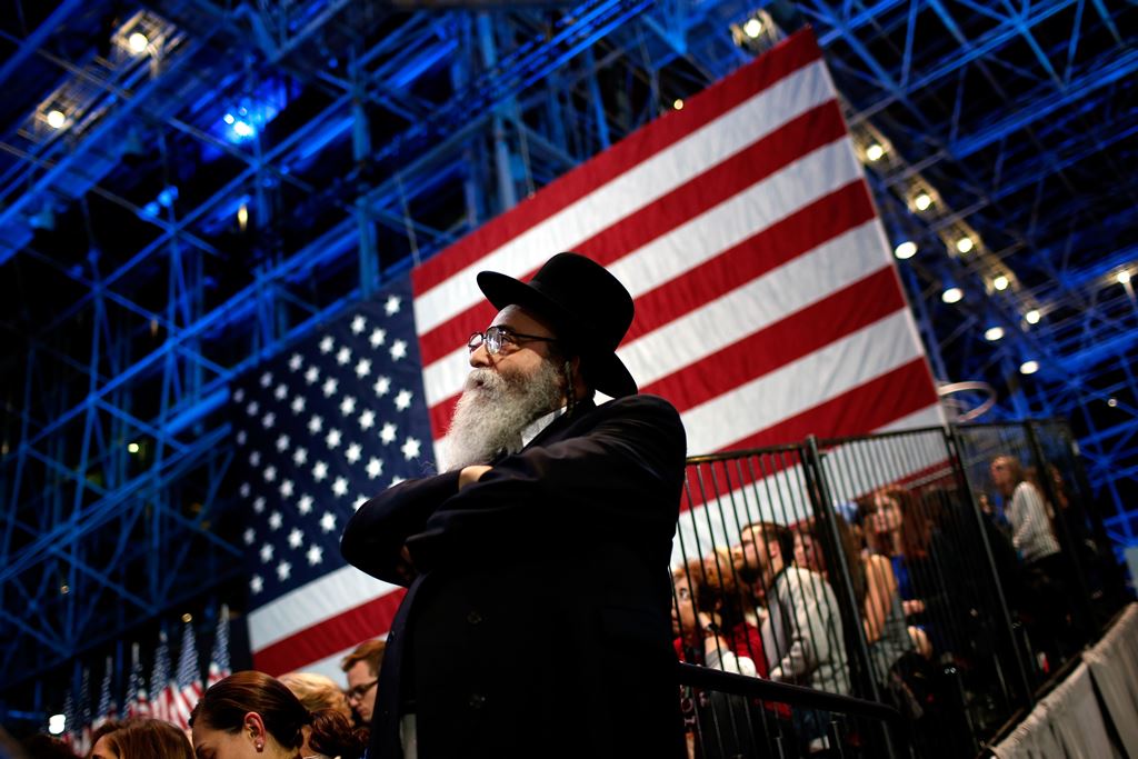 A Jewish man watches voting results come in at Democratic presidential nominee former Secretary of State Hillary Clinton's election night event at the Jacob K. Javits Convention Center November 8, 2016 in New York City. Win McNamee/Getty Images/AFP