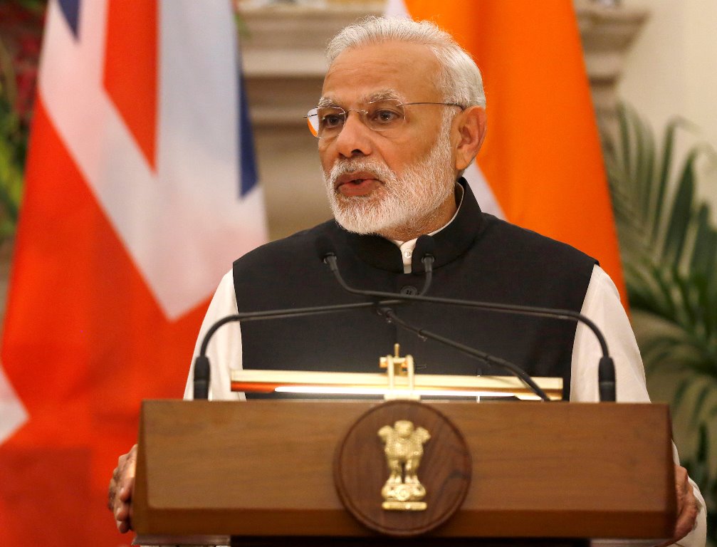 India's Prime Minister Narendra Modi reads a joint statement with his British counterpart Theresa May (unseen) at Hyderabad House in New Delhi, India, November 7, 2016. REUTERS/Adnan Abidi
