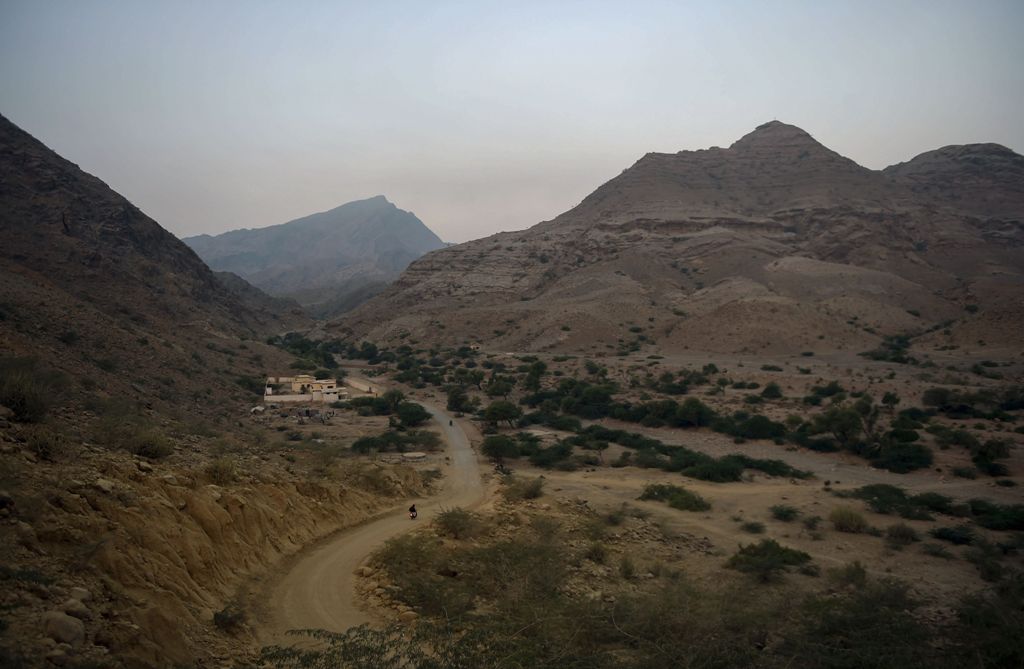 Pakistani commuters ride towards the shrine of Sufi saint Shah Noorani, some 750 kilometres (460 miles) south of Quetta, on November 13, 2016, following a suicide bomb attack. At least 52 people died and more than 100 others were injured Saturday in a bom