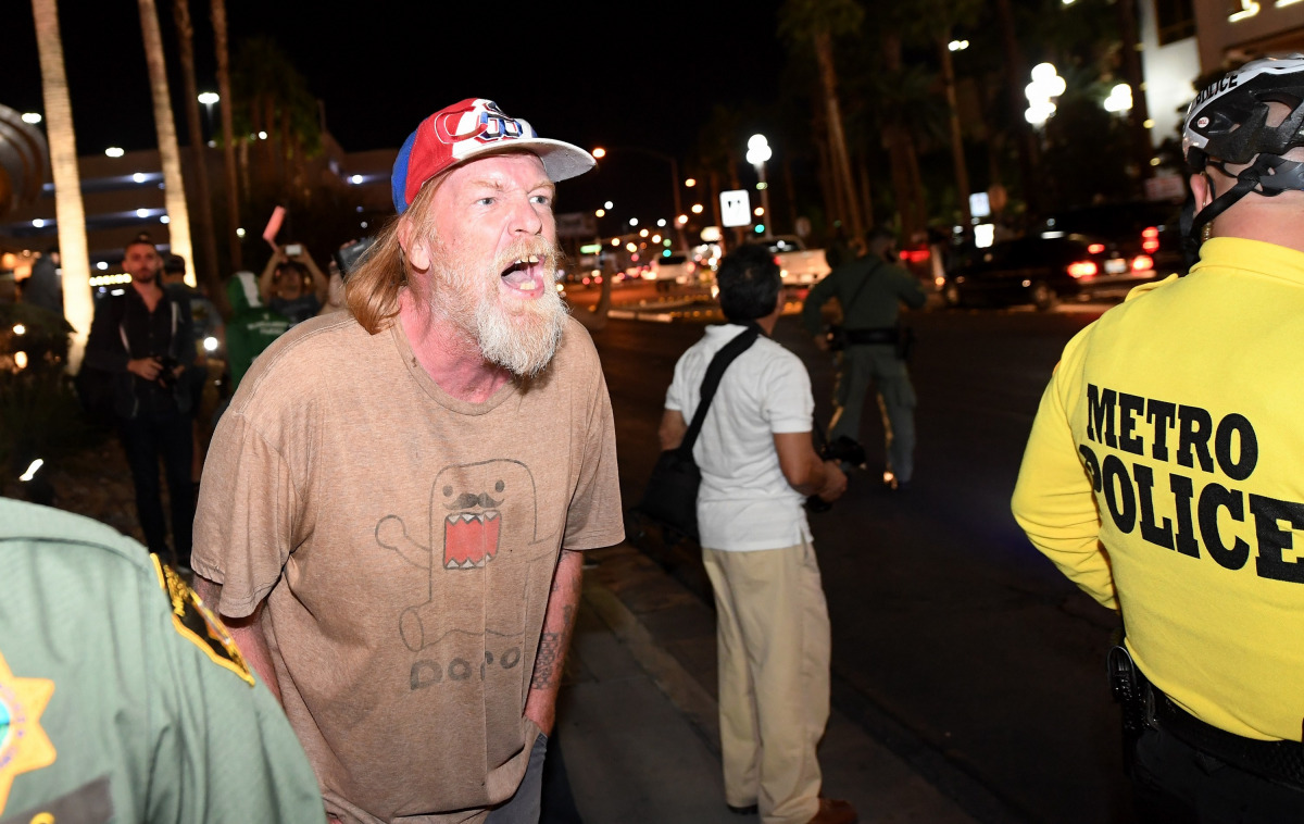 A Donald Trump supporter yells at anti-Trump protesters outside the Trump International Hotel & Tower Las Vegas on November 12, 2016 in Las Vegas, Nevada. The election of Trump as president has sparked protests in cities across the country. (Ethan Miller/