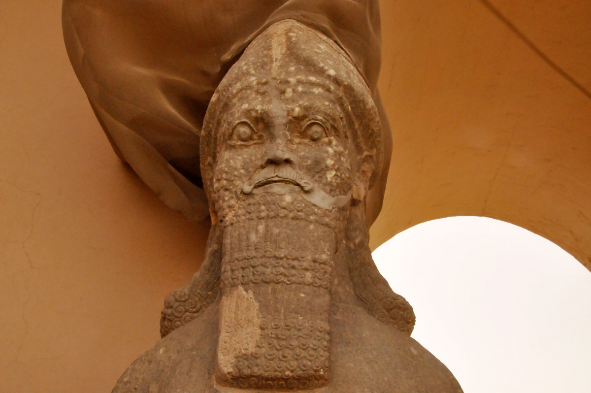 This file photo taken on April 09, 2013 shows a partial view of an ancient statue dated from the Assyrian civilization, at the archaeological site of Nimrud that lies on the Tigris River around 30 kilometres (18 miles) southeast of Mosul, Iraq's second ci