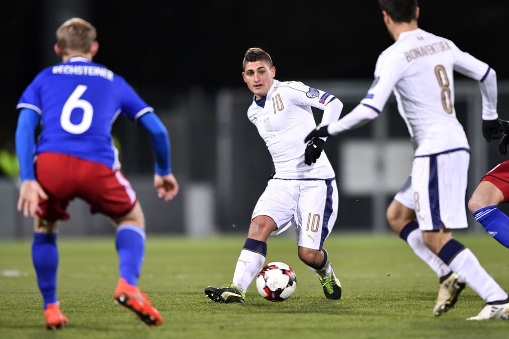 Italy's midfielder Marco Verratti (C) vies with Liechtenstein's defender Martin Rechsteiner (L) during the FIFA World Cup 2018 European group G Qualifiers football match beetween Liechtenstein and Italy on November 12, 2016 at the Rheinpark Stadion in Vad