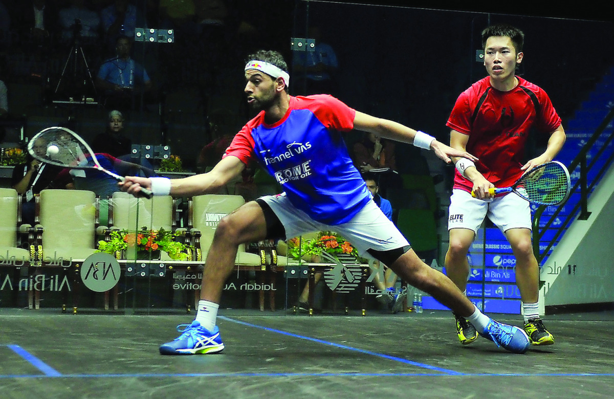 Mohamed El Shorbagy of Egypt returns to Leo Au of Hong Kong during their Qatar Classic 2016  Championship at the Khalifa International Squash Complex in Doha yesterday. Pic by: Kammutty VP/The Peninsula