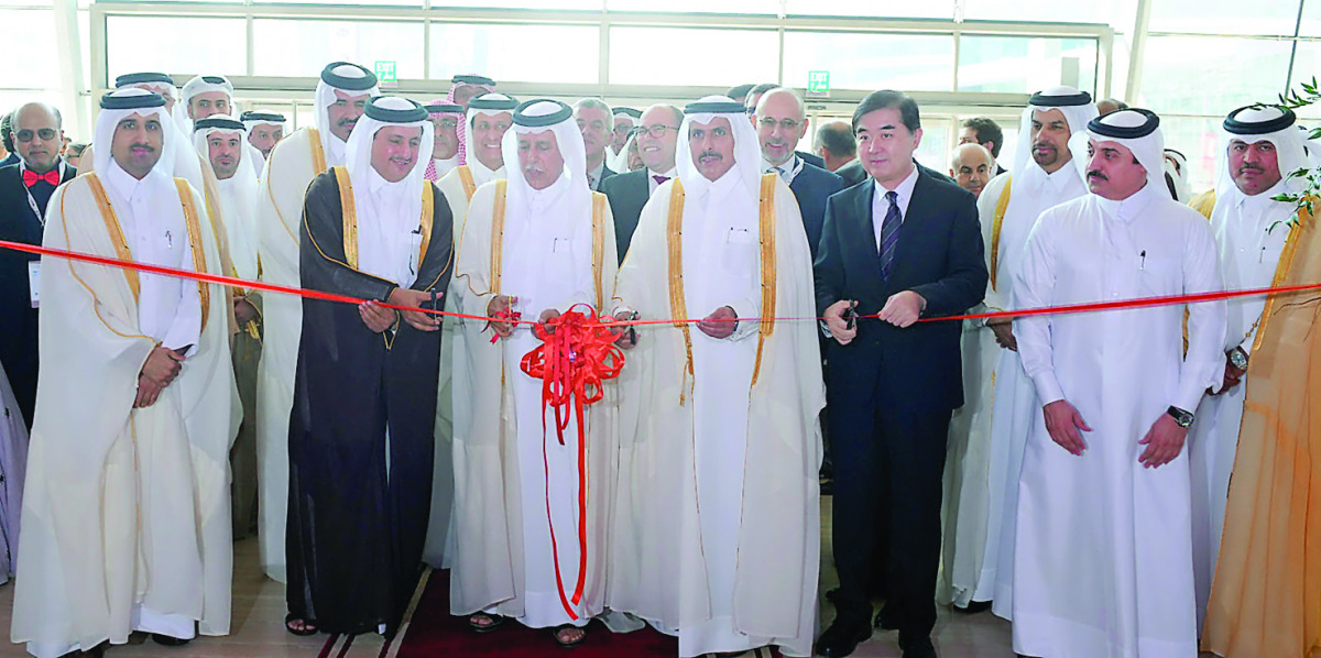 Deputy Prime Minister and Minister of State for Cabinet Affairs, H E Ahmed bin Abdullah bin Zaid Al Mahmoud (third left); QCB Governor, H E Sheikh Abdullah bin Saud Al Thani (fourth left) and Chinese Ambassador to Qatar (second right), Li Chen, opening th
