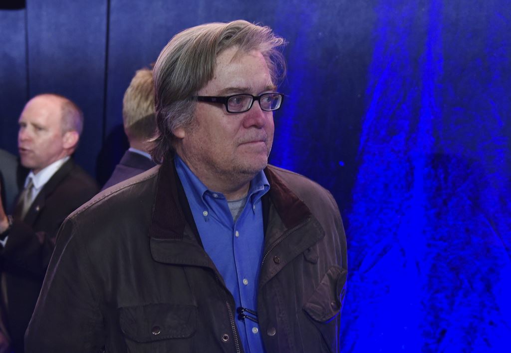 This file photo taken on November 5, 2016 shows Breitbart chairman Steve Bannon watching as Republican presidential nominee Donald Trump speaks during a rally at the Reno-Sparks Convention Center in Reno, Nevada on November 5, 2016. AFP / MANDEL NGAN
