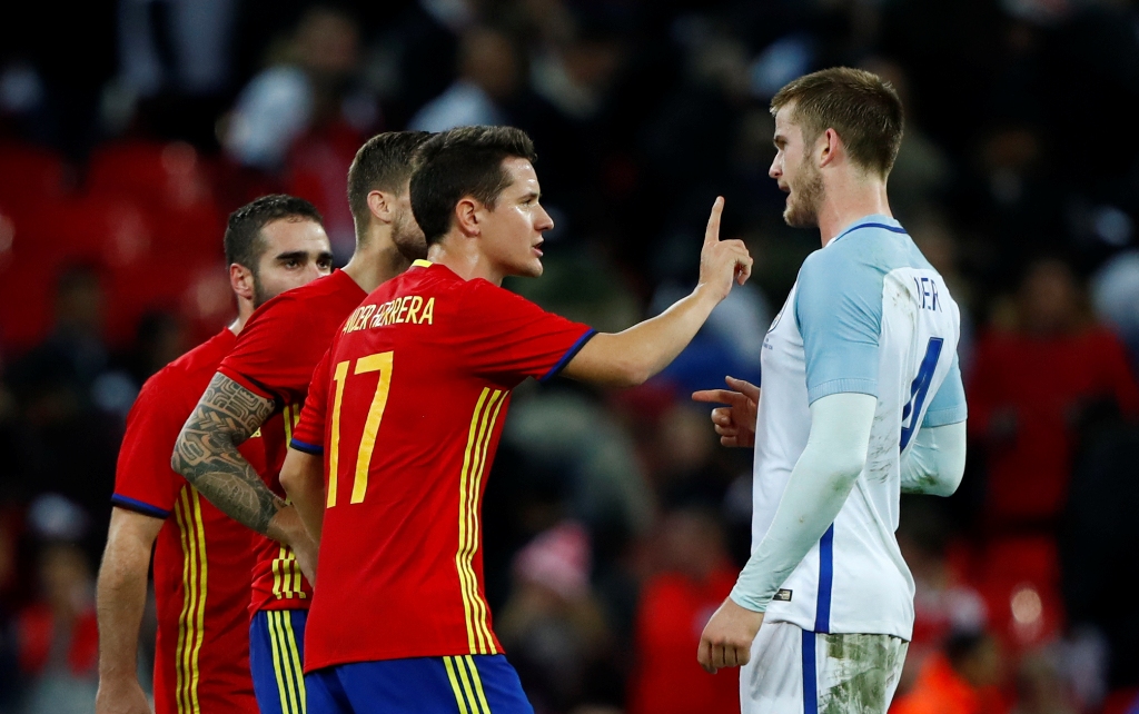 Spain's Ander Herrera clashes with England's Eric Dier. Reuters / Eddie Keogh