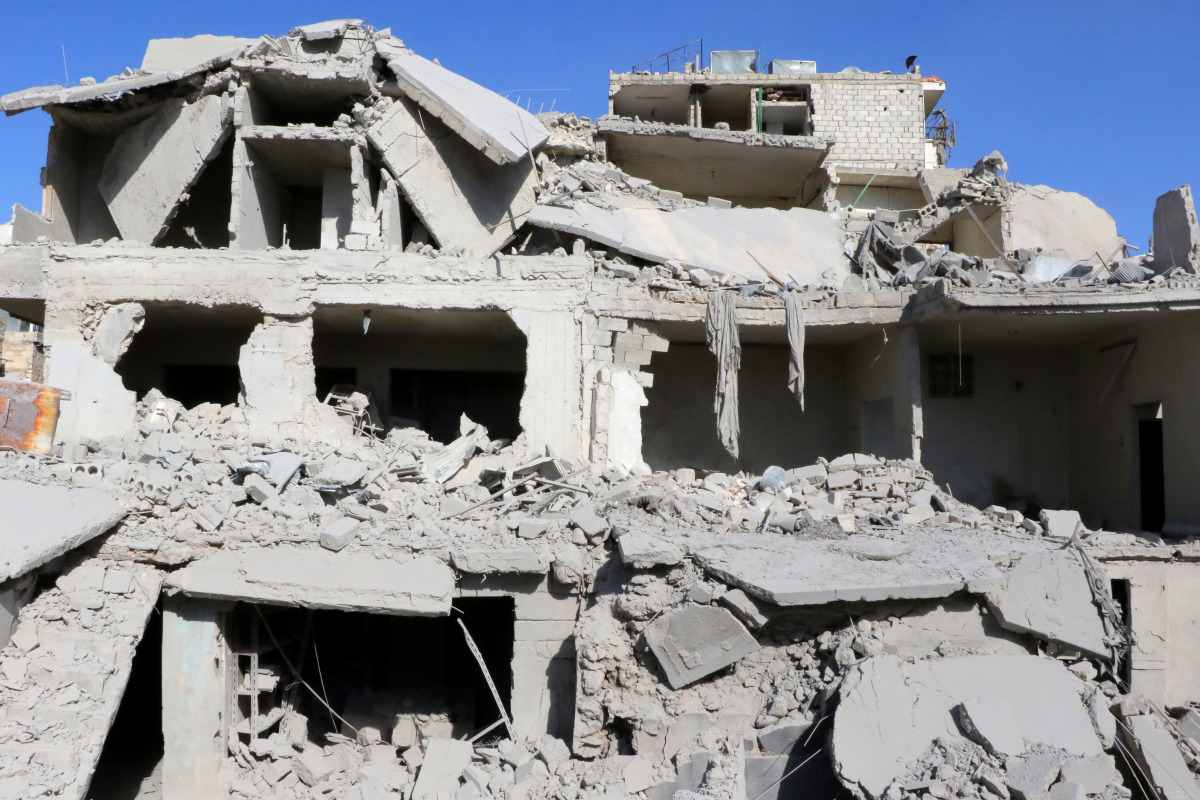 Debris of the collapsed buildings are seen after the Assad Regime's and Russian forces' airstrikes over residential areas in Maadi Neighborhood of Aleppo, Syria on November 17, 2016. (Ibrahim Ebu Leys - Anadolu Agency)