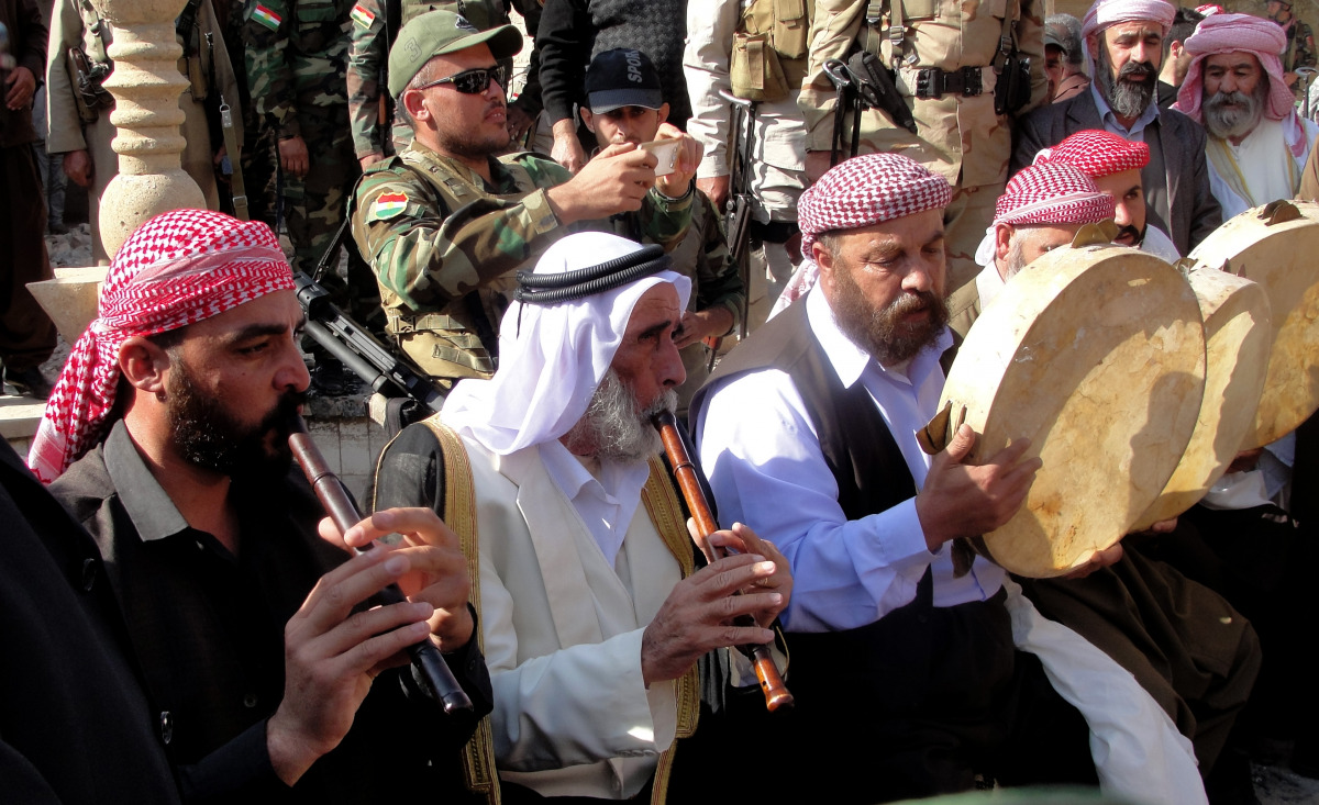 Iraqi Yezidis gather to perform their religious rituals after they return to their home following the operation to clear Bashiqa town, Mosul, November 12, 2016. (Anadolu Agency) 