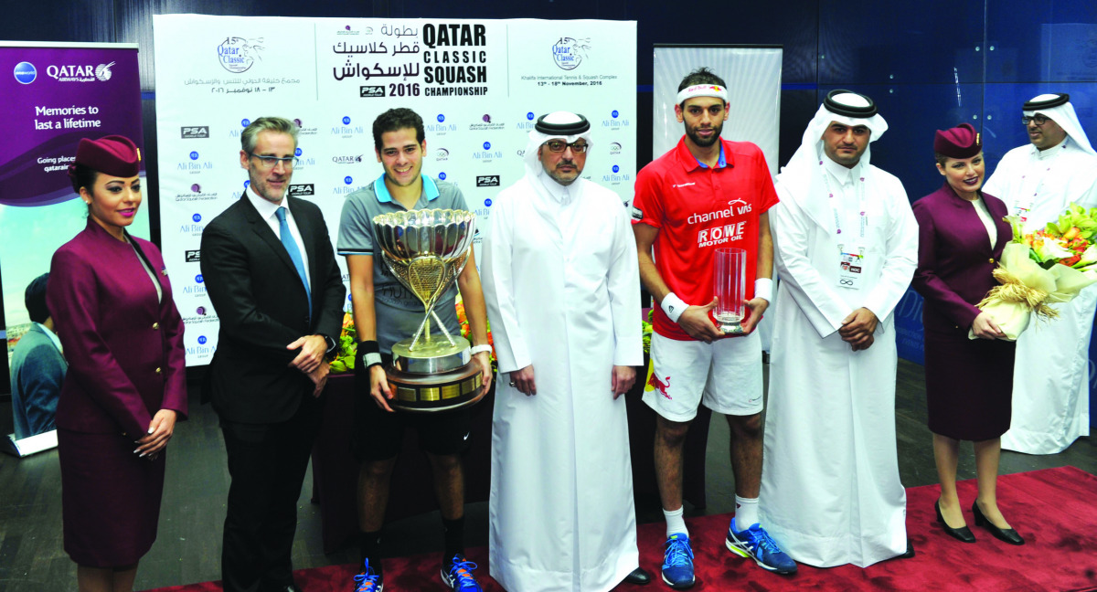 World Champion Karim Abdel Gawad (second left) of Egypt celebrates winning the Qatar Classic 2016 final in Doha yesterday. Gawad defeated World No.1 Mohamed El Shorbagy in the all-Egyptian final at the Khalifa International Squash Complex. Qatar Squash Fe