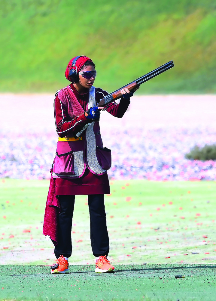 A Qatari shooter in action during the  Women's Skeet team event.