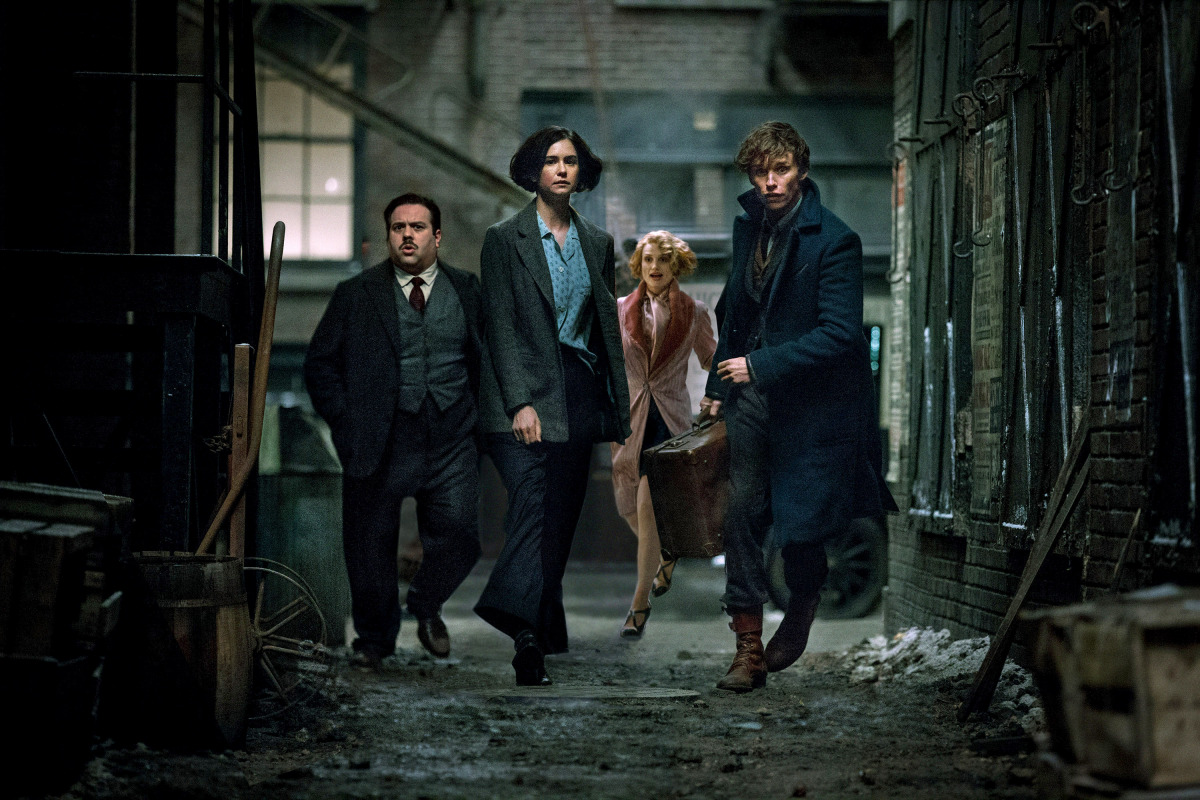 (L-R) Dan Fogler as Jacob, Katherine Waterston as Tina, Alison Sudol as Queenie and Eddie Redmayne as Newt in 