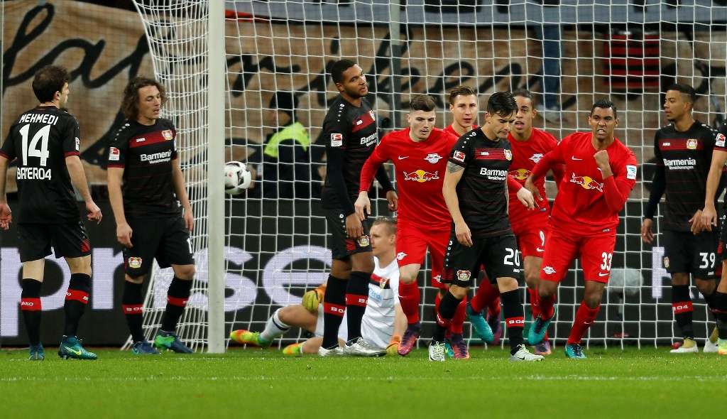Players of RB Leipzig celebrate scoring a goal during the Bundesliga football match between Bayer Leverkusen and RB Leipzig at the BayArena Stadium in Leverkusen, Germany on November 18, 2016. ( Ina Fassbender - Anadolu Agency )