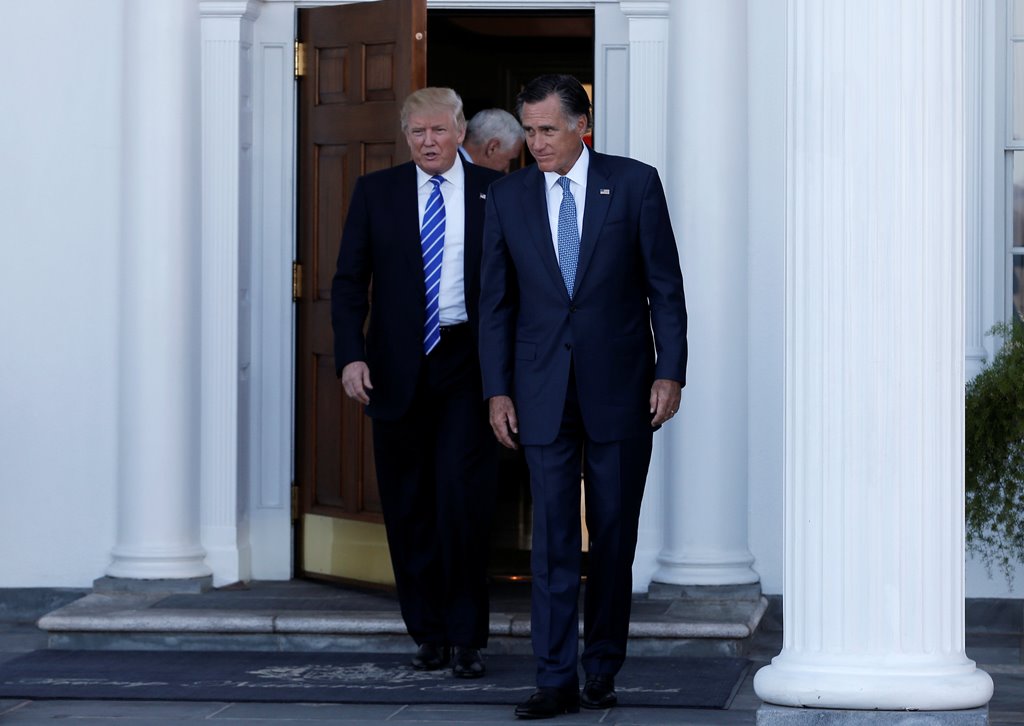U.S. President-elect Donald Trump (L) and former Massachusetts Governor Mitt Romney (R) emerge after their meeting at the main clubhouse at Trump National Golf Club in Bedminster, New Jersey, U.S., November 19, 2016. REUTERS/Mike Segar
