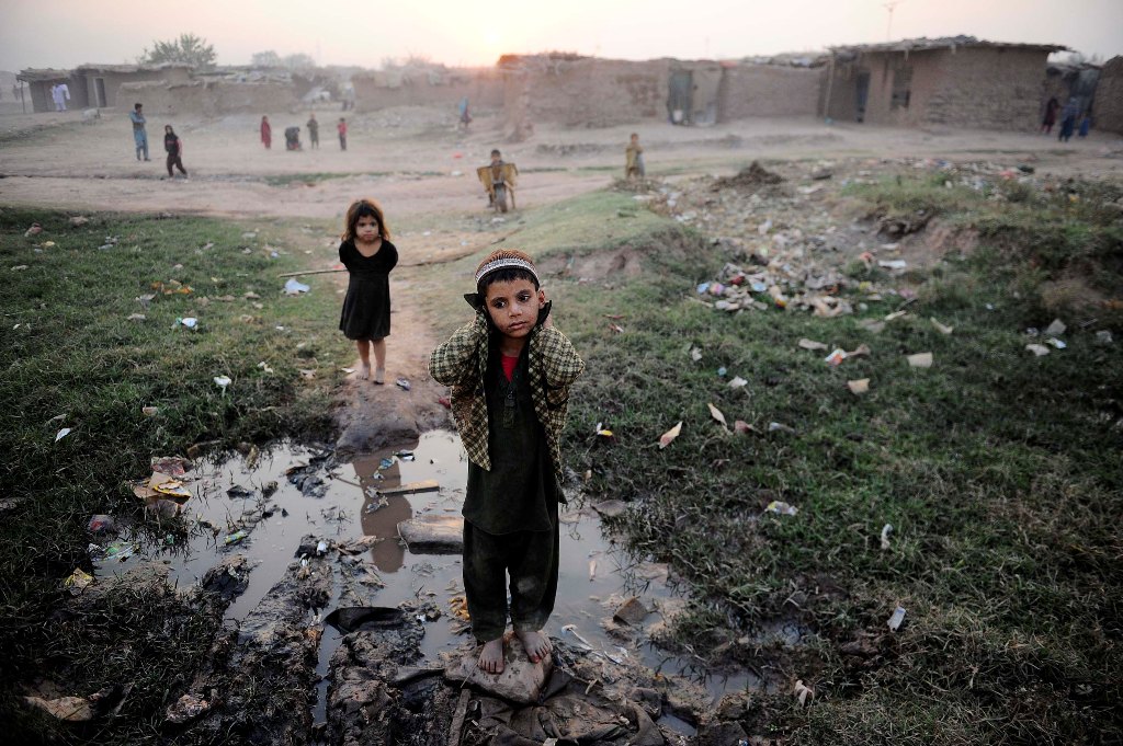 Afghani children are seen during the World Children's day, at the Afghani Refugee camp in Islamabad, Pakistan on November 20, 2016. ( Metin Aktas - Anadolu Agency )
