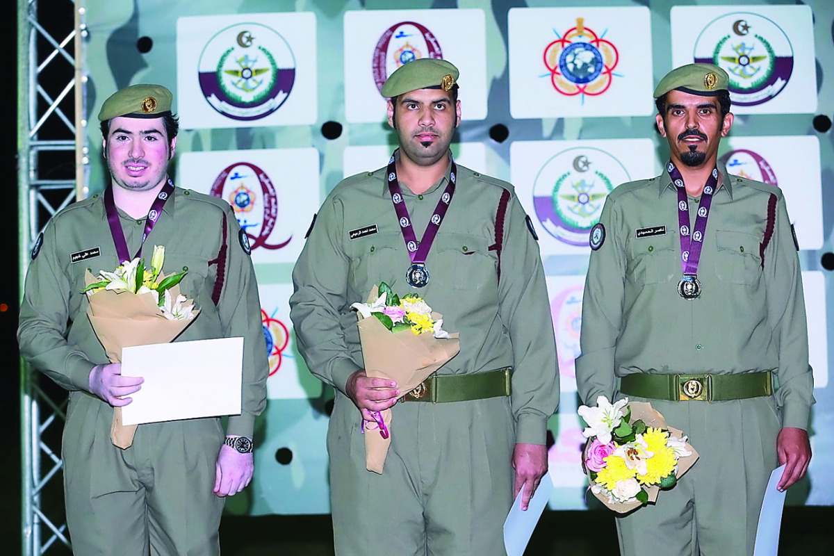 Silver medallists of Men's Shotgun trap event,  Qatari shooters Mohammed Al Rumaihi, Nasser Al Humaidi and Mohammed Khejaim on the podium.