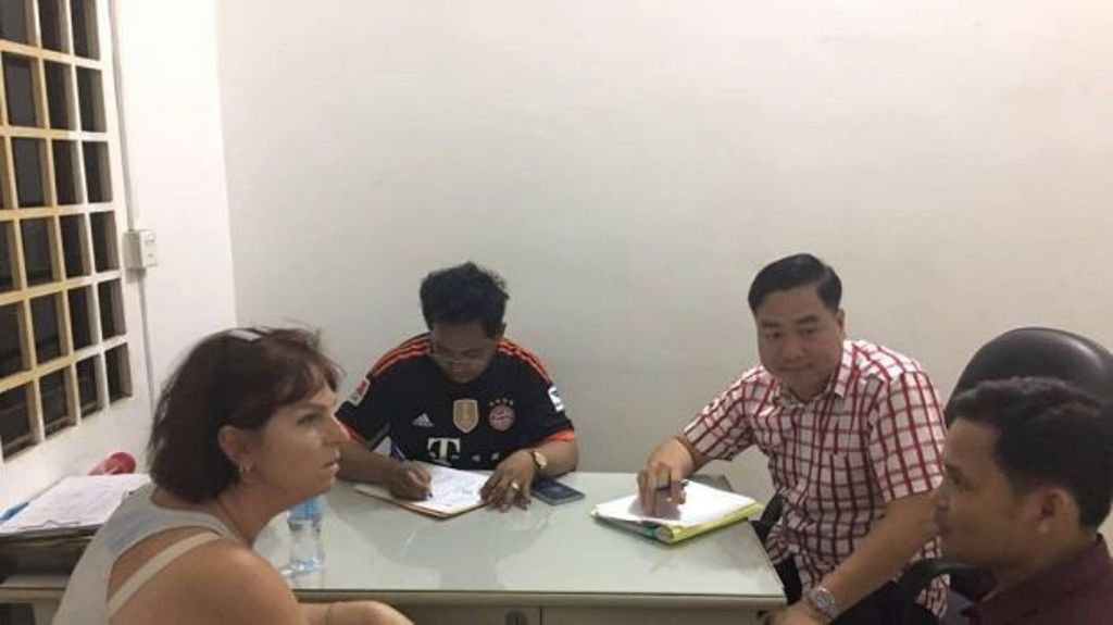 Tammy Davis-Charles being questioned. Photo: Cambodian National Police.