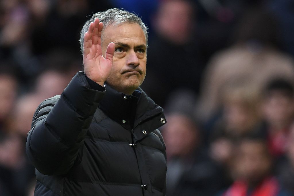 Manchester United's Portuguese manager Jose Mourinho waves to the fans following the English Premier League football match between Manchester United and Arsenal at Old Trafford in Manchester, north west England, on November 19, 2016. The match ended in a 
